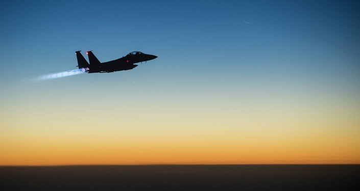 A US Air Force F-15E Strike Eagle aircraft flies over northern Iraq Sept. 23, 2014