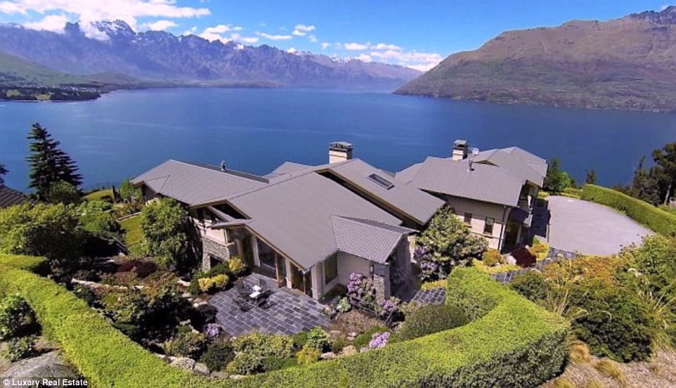 Threatened: The super-rich are fear their comfortable lifestyles in the west could be destroyed by terrorism or civil unrest, so have started buying up 'boltholes' in New Zealand, like this award-winning five bedroom house, just a five minute drive from Queenstown