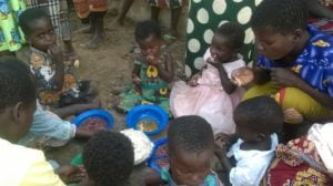 Children eating food at Nova Gaia orphanage