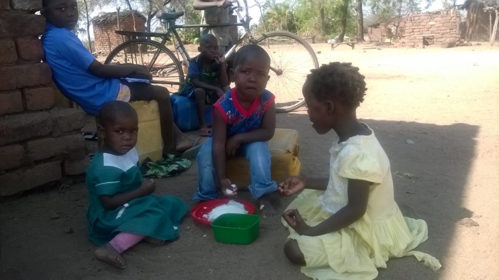 Children having a meal at Nova Gaia Orphanage Malawi