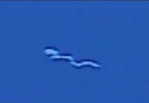 Giant Silkworm UFO Passes Over Mississauga and Toronto, Ontario Skyline