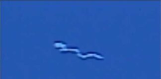 Giant Silkworm UFO Passes Over Mississauga and Toronto, Ontario Skyline